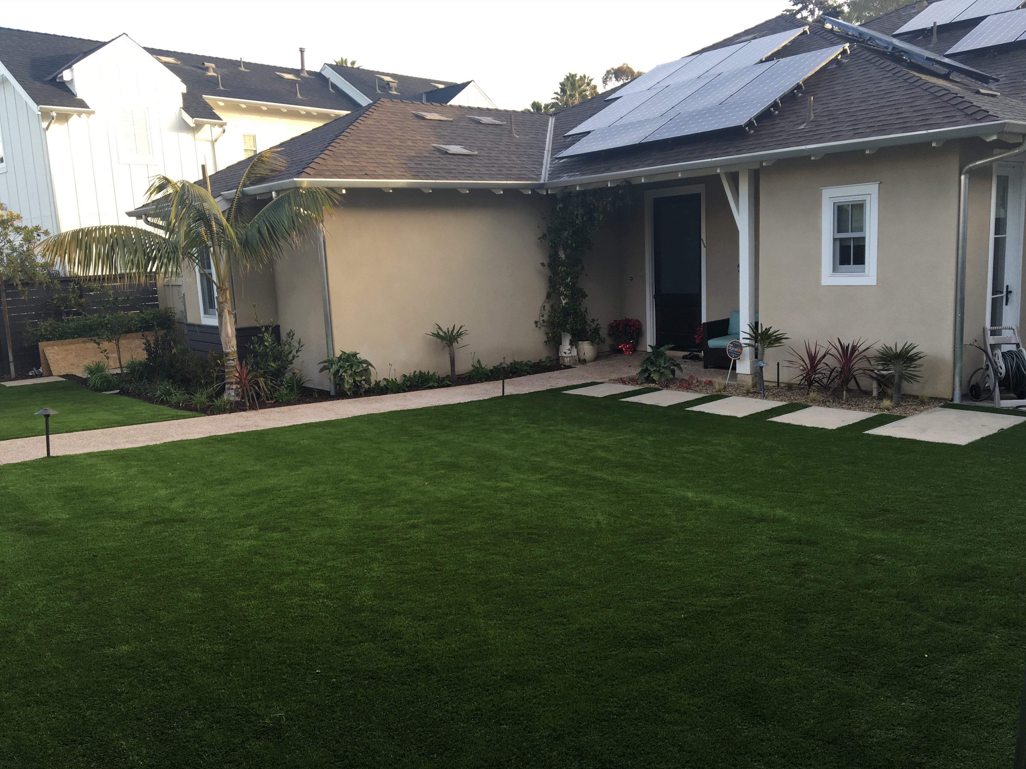 Close-up of artificial grass installation showing realistic turf fibers