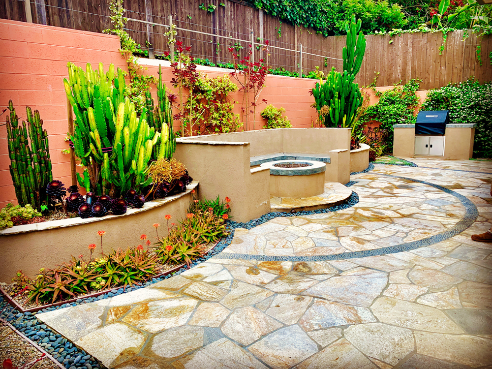 Custom fire pit and BBQ island in a San Diego backyard