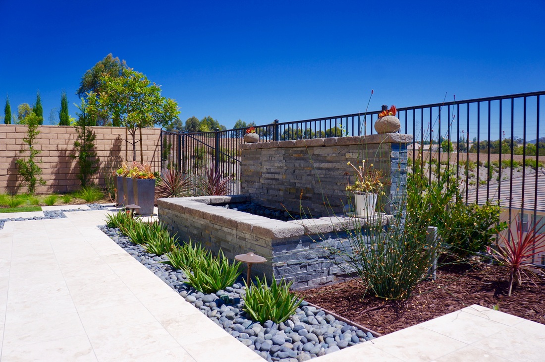 Custom garden walkway with stepping stones and native plantings in North County San Diego