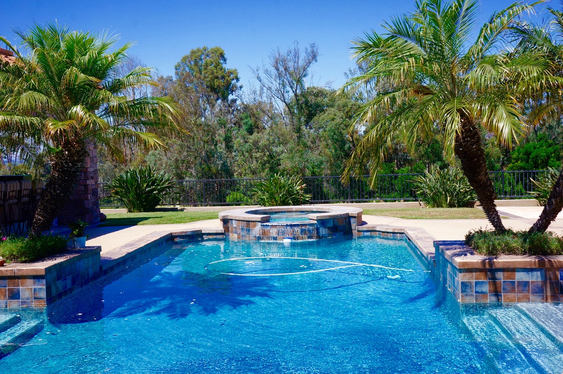 Resort-style pool with blue water