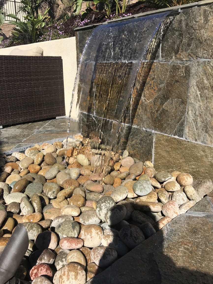 New build landscape with retaining walls and native planting