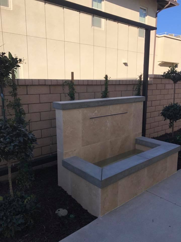 Residential landscape with accent lighting and pathway