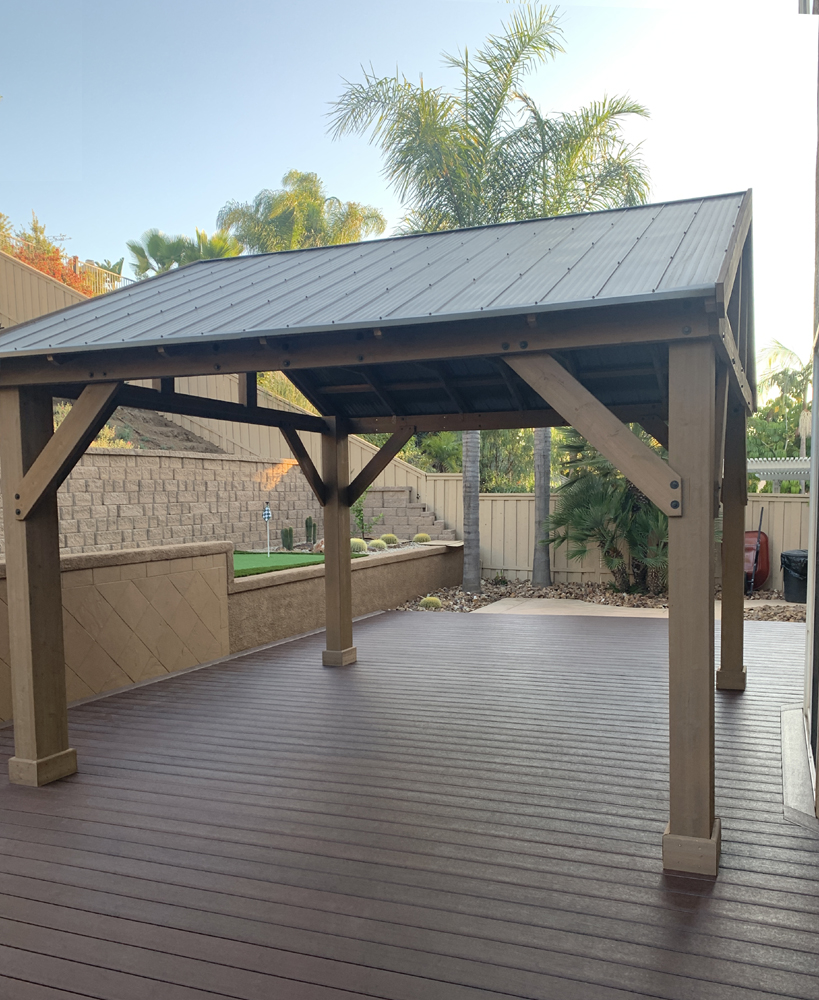 Wood deck with covered pergola built by Arcadian Landscape in San Diego